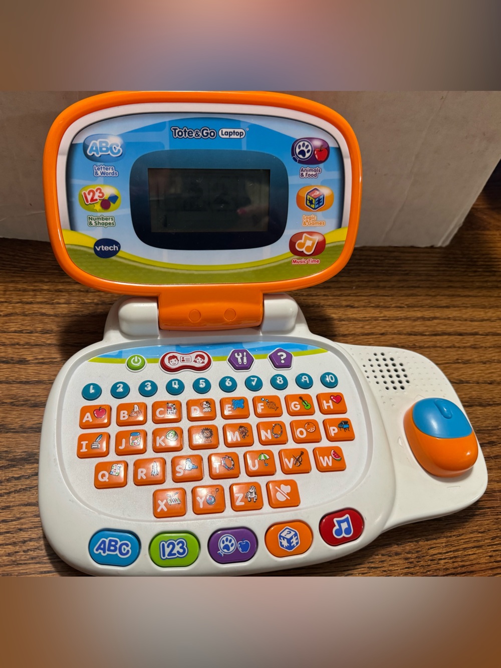 Vtech Orange and White tote & go Kids Learning Laptop - ABC 123